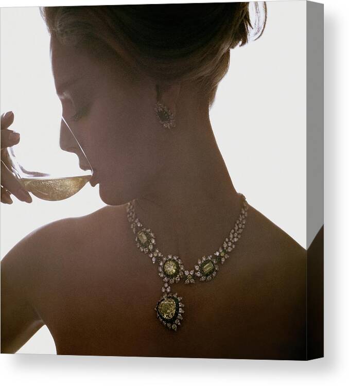 Jewelry Canvas Print featuring the photograph Close Up Of A Young Woman Wearing Jewelry by Bert Stern