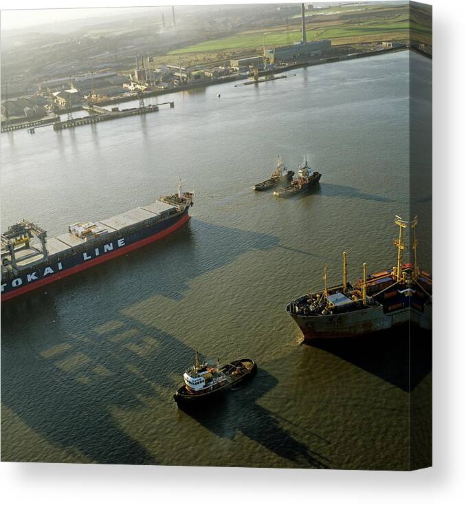 Boat Canvas Print featuring the photograph Container Ship Being Towed By Tug Boats by Skyscan/science Photo Library