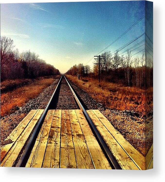 Canada Canvas Print featuring the photograph Could Go On Forever. #railroad #driving by Kelsey Parisien