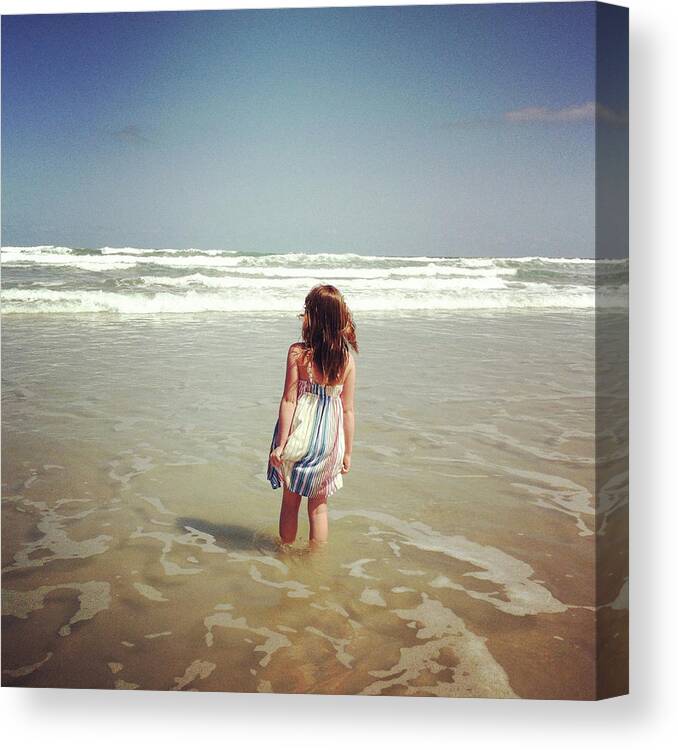 Scenics Canvas Print featuring the photograph Girl Wading In Ocean by Cyndi Monaghan