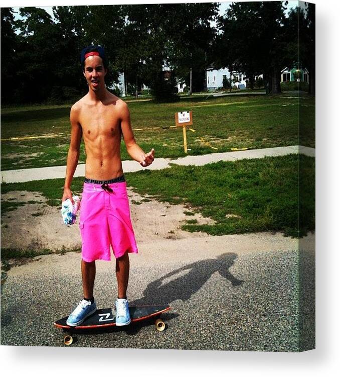  Canvas Print featuring the photograph Grand Haven Longboarding by Joel .