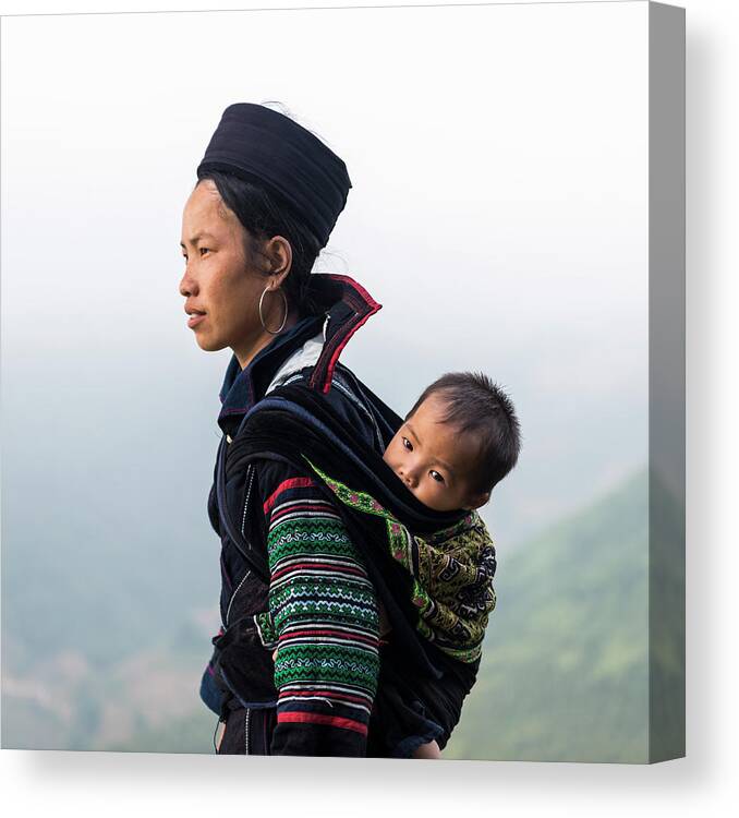 People Canvas Print featuring the photograph Hill Tribe Woman Carrying Baby On Back by Martin Puddy