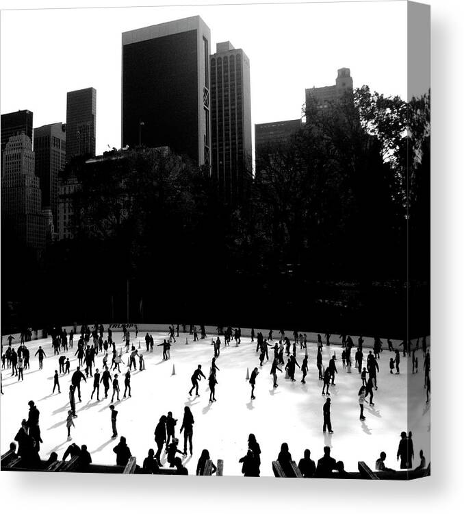 Recreational Pursuit Canvas Print featuring the photograph Ice Skating In Nyc by John E Davidson