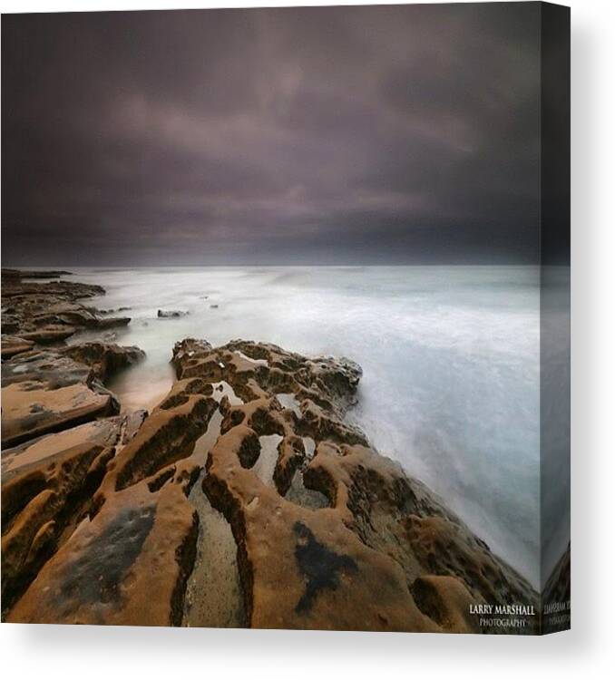  Canvas Print featuring the photograph Long Exposure Sunset On A Dark Stormy by Larry Marshall