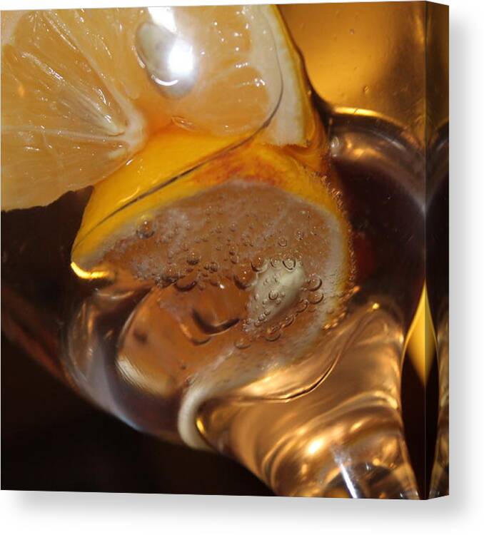 Looking Up At A Glass With A Lemon In It. Canvas Print featuring the photograph Margarita by Stella Robinson