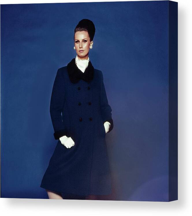 Fashion Canvas Print featuring the photograph Model Wearing A Ben Zuckerman Coat by Bert Stern