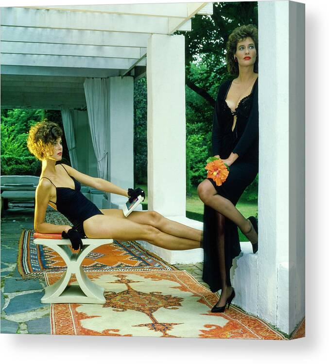 Hair Canvas Print featuring the photograph Models Wearing A Swimsuit And Lingerie On A Patio by Horst P. Horst
