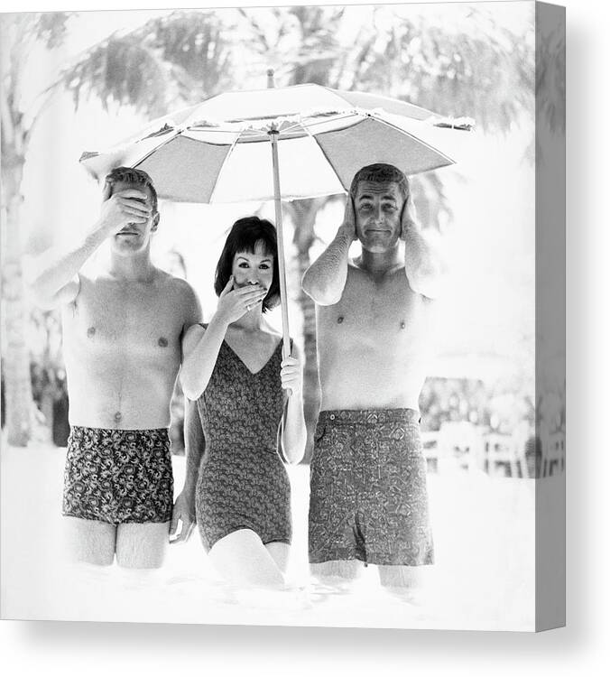 Rio De Janeiro State Canvas Print featuring the photograph Models Wearing Swimwear by Richard Waite