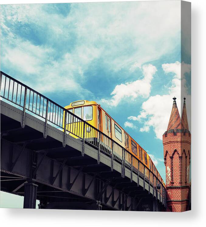 Berlin Canvas Print featuring the photograph Moving Yellow Train In Kreuzberg U-bahn by Danilovi