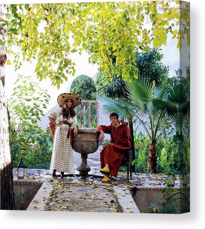 Marrakesh Canvas Print featuring the photograph Paul And Talitha Getty By Fountain by Patrick Lichfield