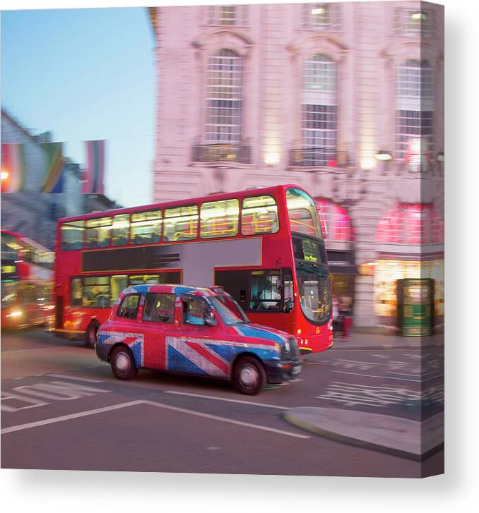 Piccadilly Circus Canvas Print featuring the photograph Piccadilly Circus, London Cab And Bus by Grant Faint