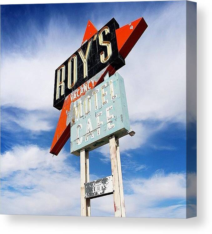 Route66 Canvas Print featuring the photograph Roy's Vintage Neon Sign In Amboy by Cristi Bastian