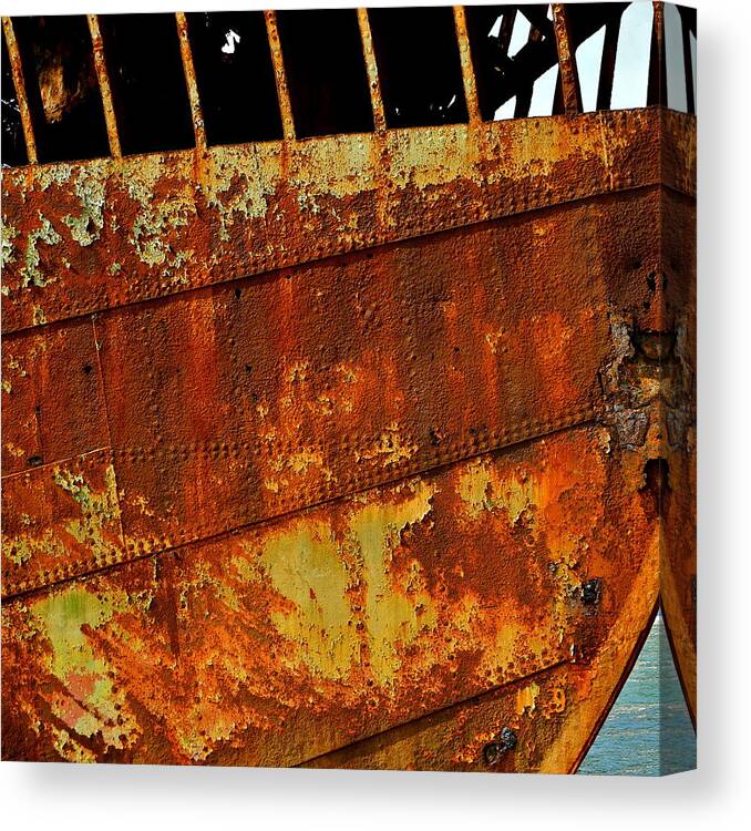 Rusty Canvas Print featuring the photograph Rusty Remains of an Old Boat by Kirsten Giving