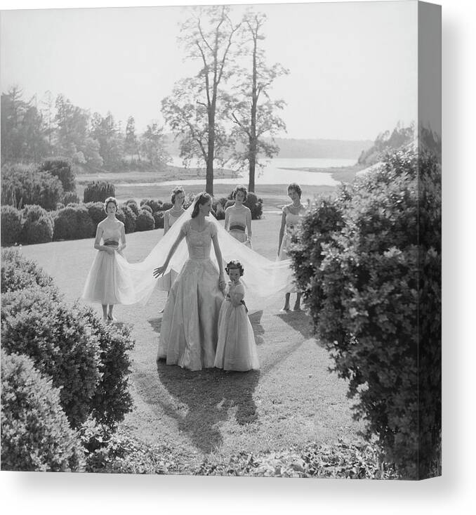 Society Canvas Print featuring the photograph Sidney Bacon In Garden With Her Bridesmaids by Horst P. Horst