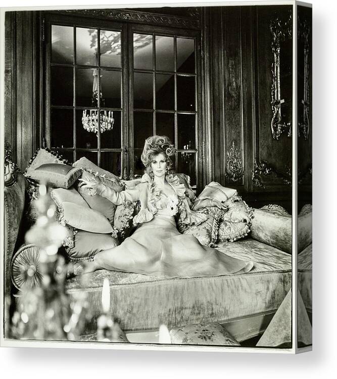 Personality Canvas Print featuring the photograph Suzy Mehle On A Sofa In Her Mansion by Raymundo de Larrain