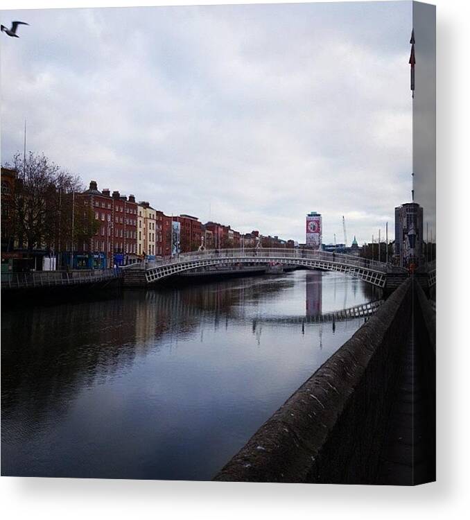 Beautiful Canvas Print featuring the photograph The Ha'penny Bridge Over The River by Jordan Napolitano