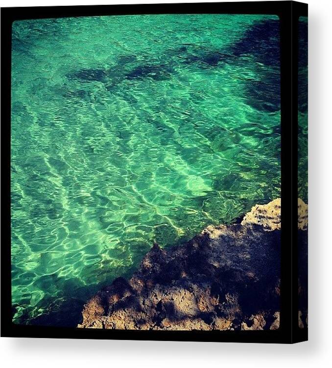 Water Canvas Print featuring the photograph The Tranquil Waters Of Mallorca by Theo Knipe