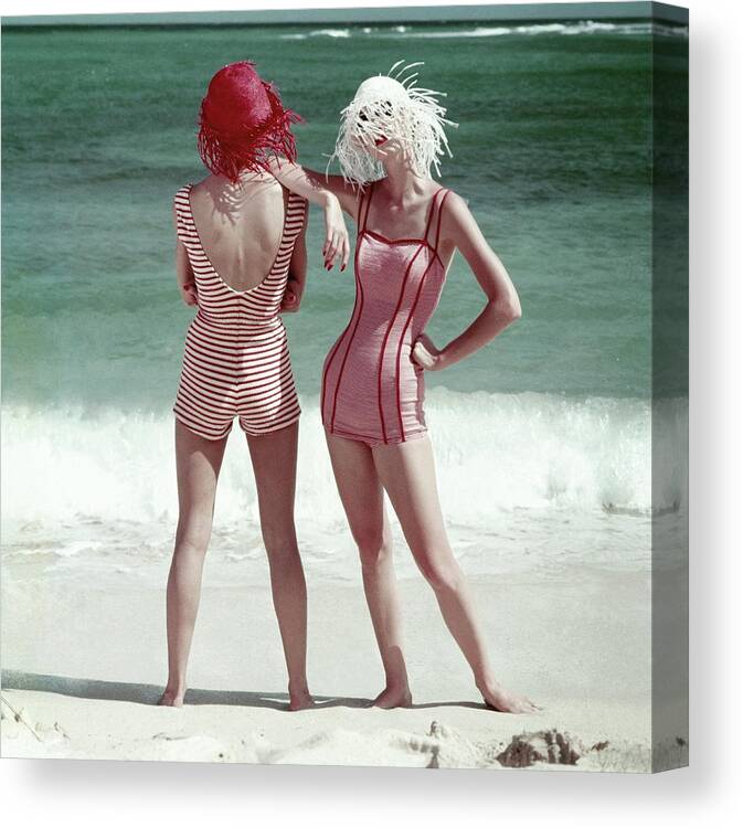 Two People Canvas Print featuring the photograph Two Models Standing On A Beach by Frances McLaughlin-Gill