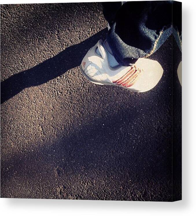 Walking Canvas Print featuring the photograph #walking #adidas #sneakers #road #shadow by Katie Ball