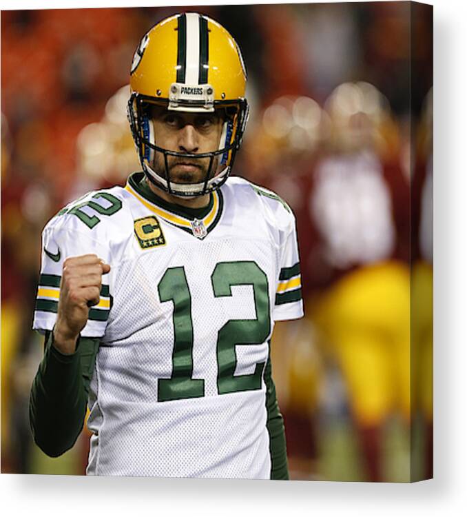 Playoffs Canvas Print featuring the photograph Wild Card Round - Green Bay Packers v Washington Redskins by Rob Carr