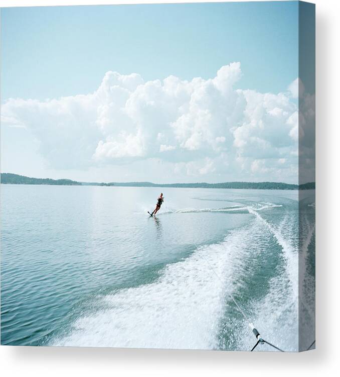 Archipelago Canvas Print featuring the photograph Woman Water-skiing by Johner Images