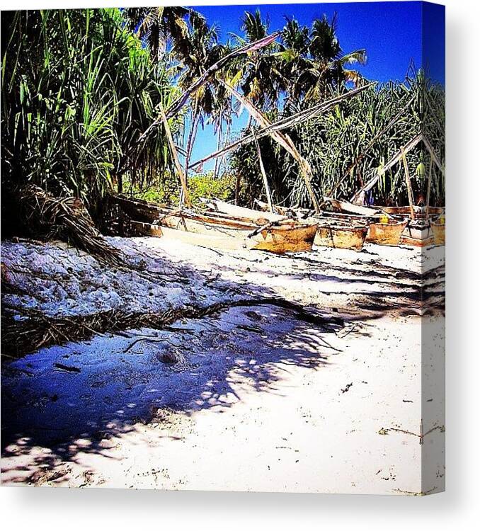 Beautiful Canvas Print featuring the photograph Wooden Boats On The Beach by Luca Gaudenzi