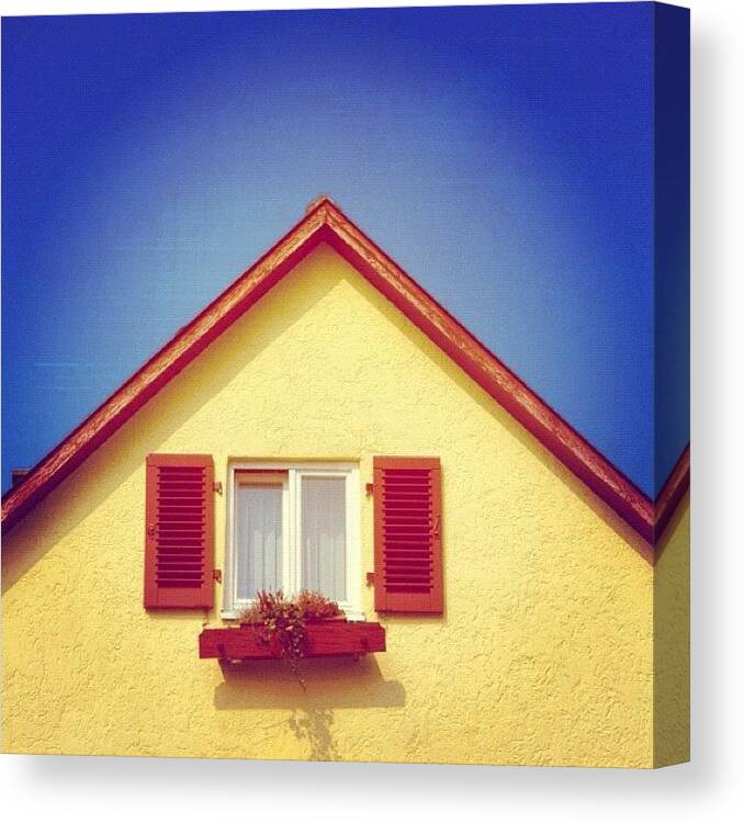 House Canvas Print featuring the photograph Gable of beautiful house in front of blue sky #1 by Matthias Hauser