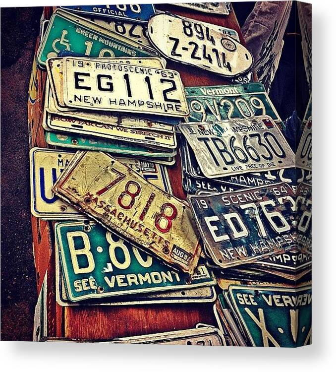 Bricabrac Canvas Print featuring the photograph #bricabrac #licenseplates #antiques by Emily Hames