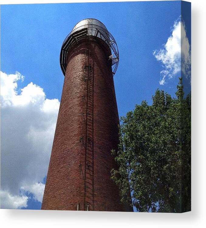 Clouds Canvas Print featuring the photograph #brick #watertower #sky #clouds #tree by Caleb Kennedy