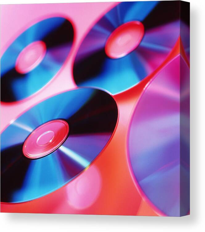 Compact Disc Canvas Print featuring the photograph Cd-roms by Tek Image