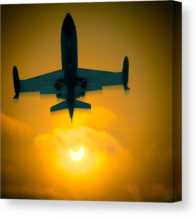 Jet Canvas Print featuring the photograph Eclipse Of The Sun by Chris Lord