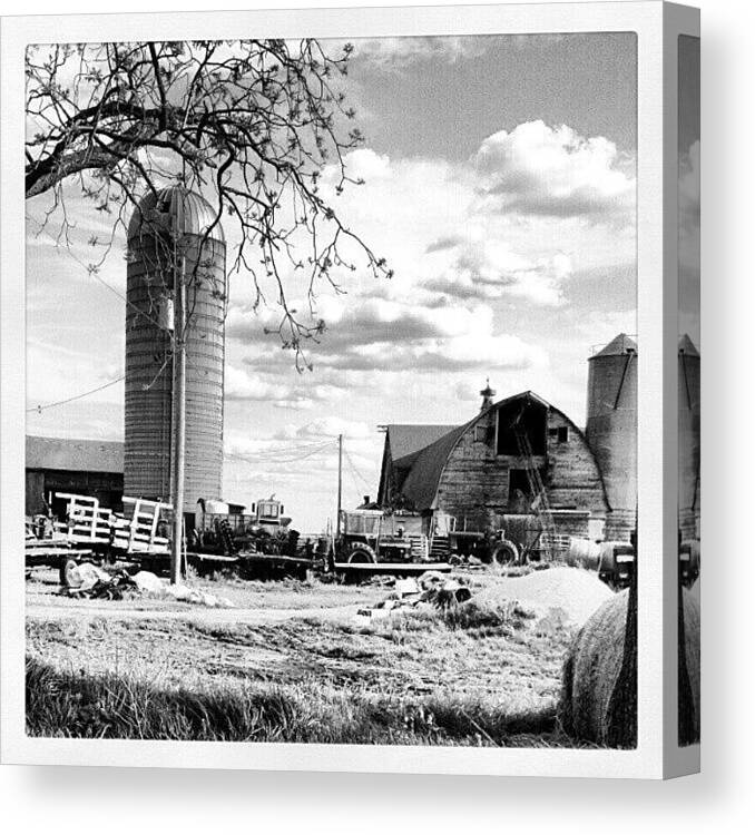 Blackandwhite Canvas Print featuring the photograph #farm #barn #tractor #cloud by Bryan P