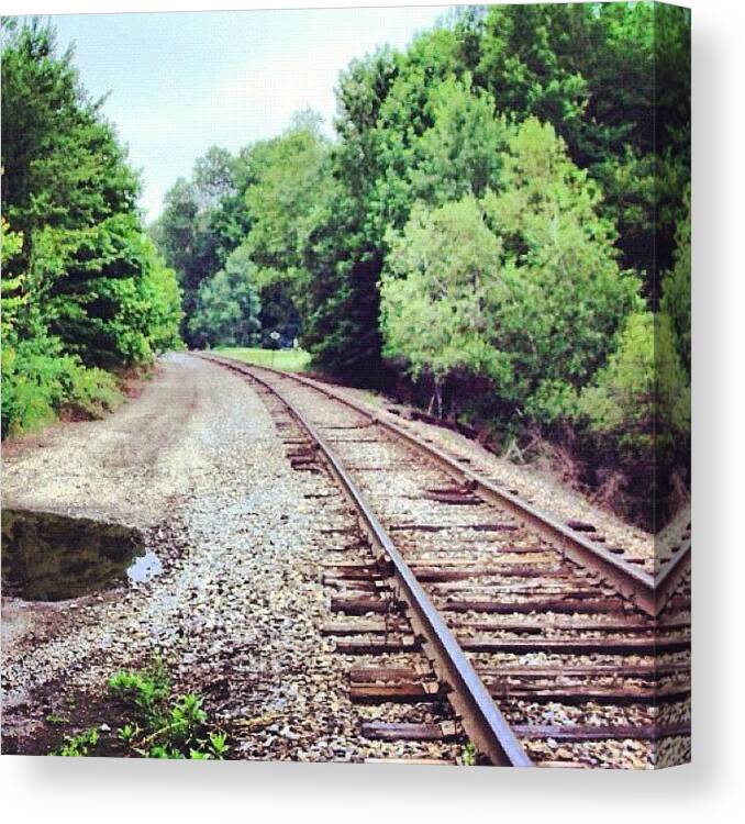 Railroad Canvas Print featuring the photograph Looking Down The Tracks by Courtney Meunier