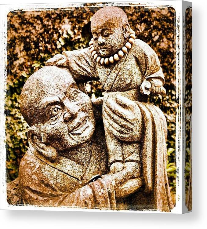  Canvas Print featuring the photograph Monk With Baby Buddha Statue At by Jonathan Tyrrell 