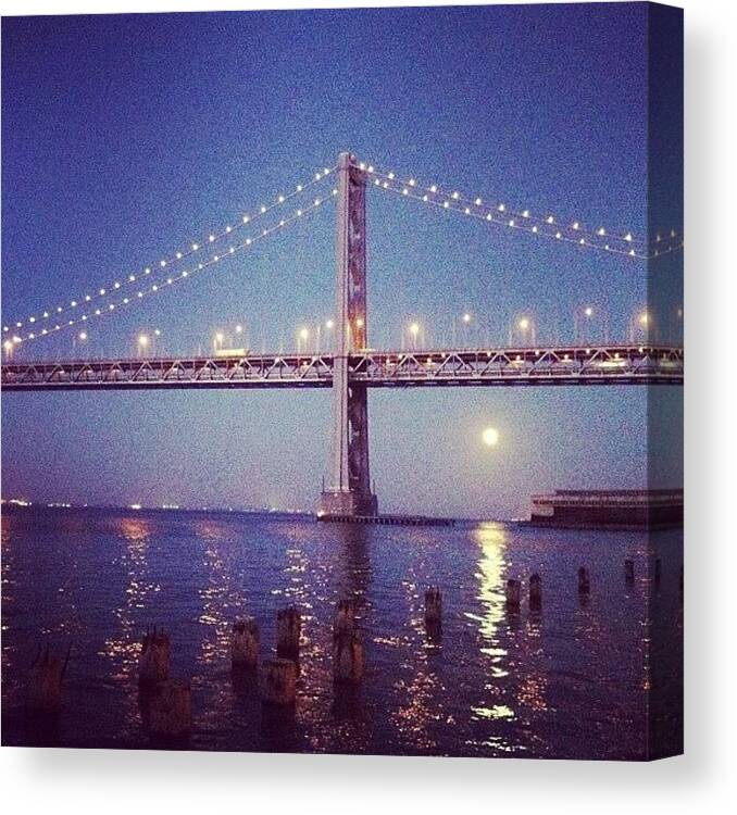  Canvas Print featuring the photograph Moonrise Behind The Bay Bridge by Christopher Chan