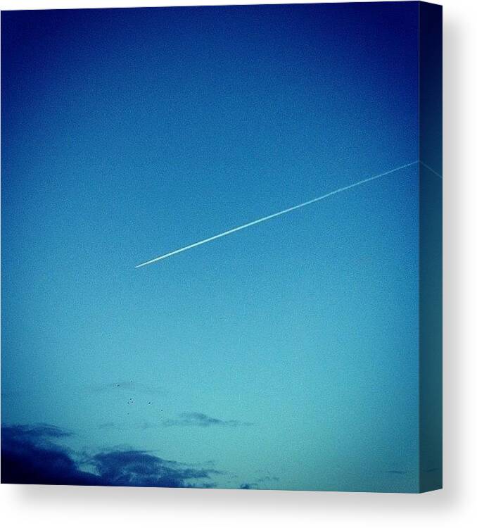 Sky Canvas Print featuring the photograph Plane in Flight by Peter McD