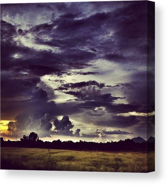 Drama Canvas Print featuring the photograph Riders Of The Storm #sky #clouds #drama by Maura Aranda