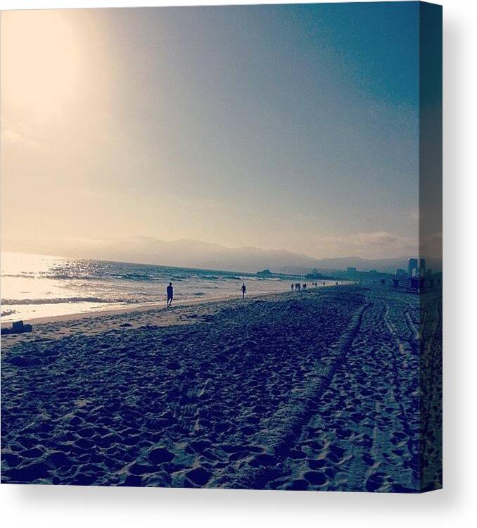 Sunset Canvas Print featuring the photograph Santa Monica beach by Lana Rushing