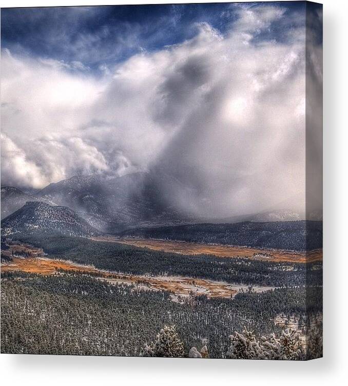 Colorado Canvas Print featuring the photograph Snowstorm Rolling In To Rocky Mountain by Chris Bechard