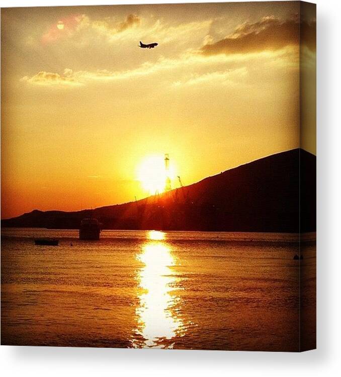 Beautiful Canvas Print featuring the photograph #sun #sunset #plane #reflection by Zain Master