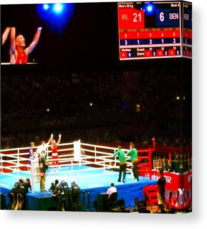 Olympics Canvas Print featuring the photograph Victory In The Ring by Mike Leport
