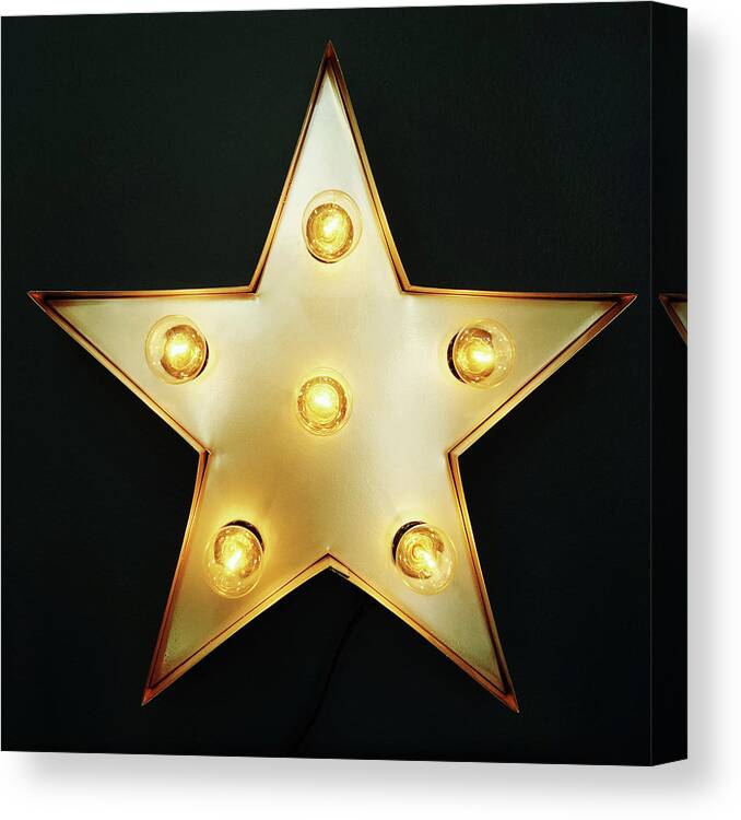 Star Canvas Print featuring the photograph Decorative star with light bulbs by GoodMood Art