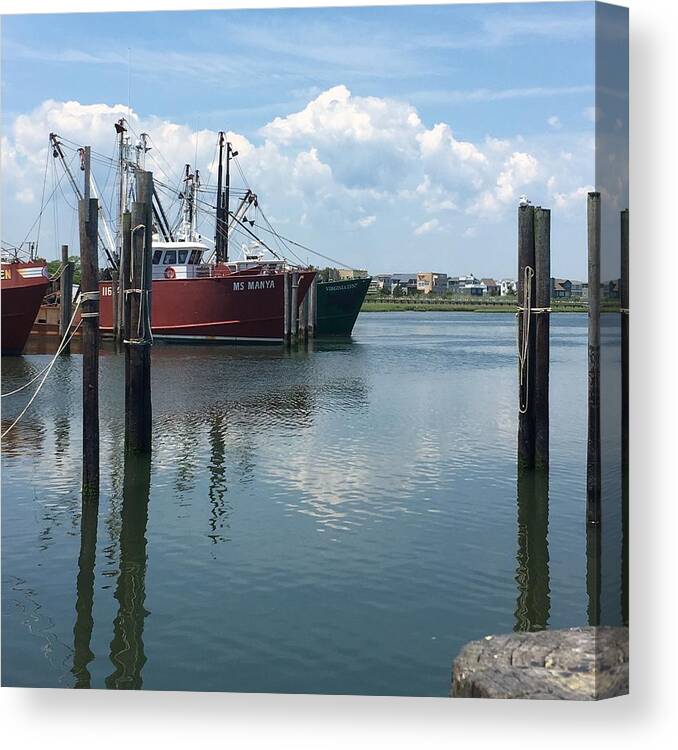 Red Boat Canvas Print featuring the photograph Docked at Barnegat Light by Dottie Visker