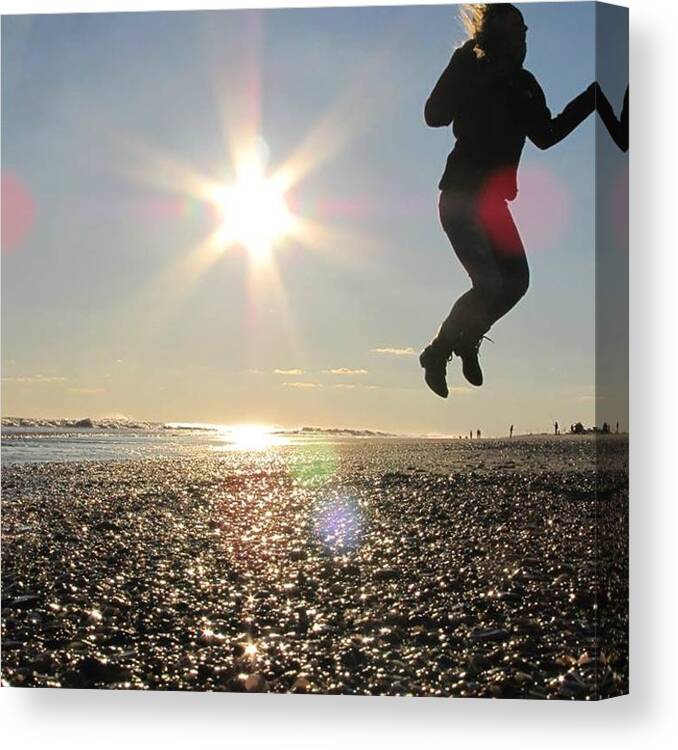 Sun Canvas Print featuring the photograph Jumping in the Sun by Laura Henry