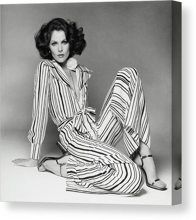 Accessories Canvas Print featuring the photograph Lois Chiles Wearing A Striped Pajama And Blouse by Francesco Scavullo