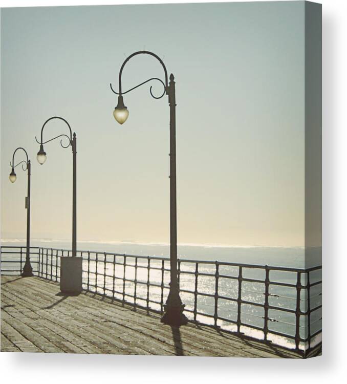 Ocean Canvas Print featuring the photograph On The Pier by Linda Woods