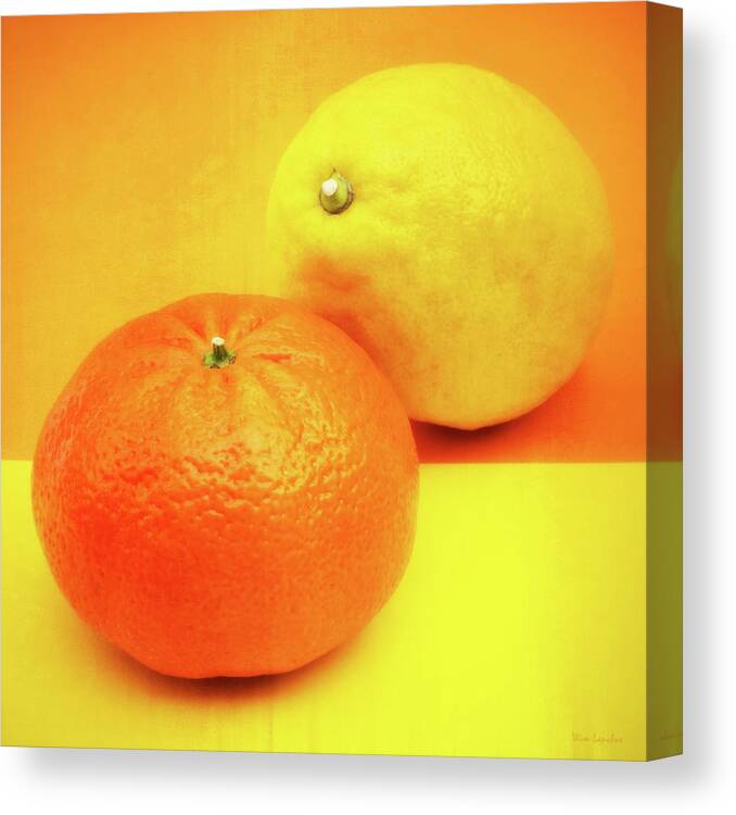 Orange Canvas Print featuring the photograph Orange and Lemon by Wim Lanclus