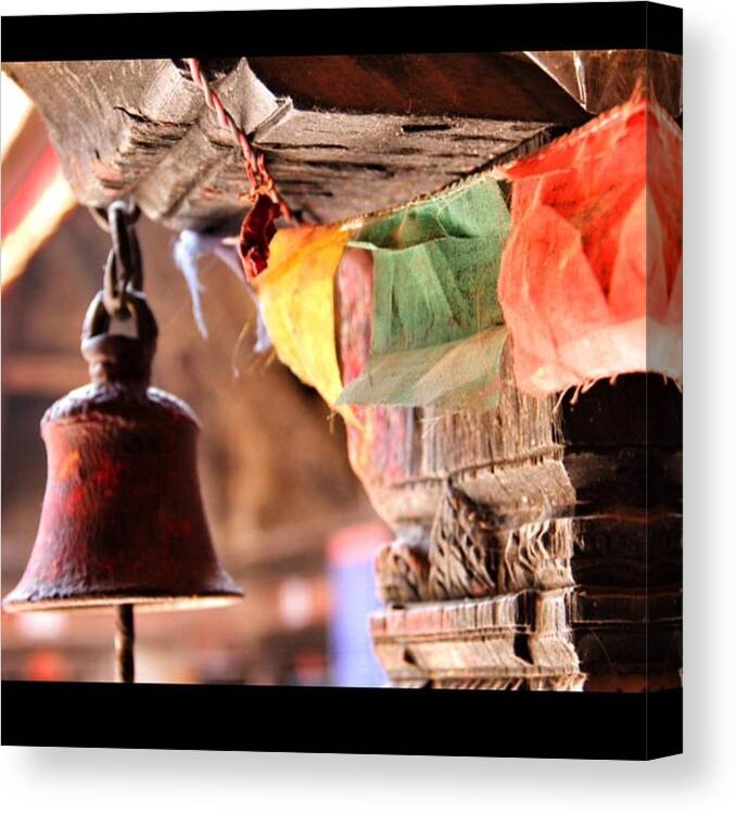 Hkellex13 Canvas Print featuring the photograph Prayer Flags And Bell At A Tiny Temple by Lorelle Phoenix