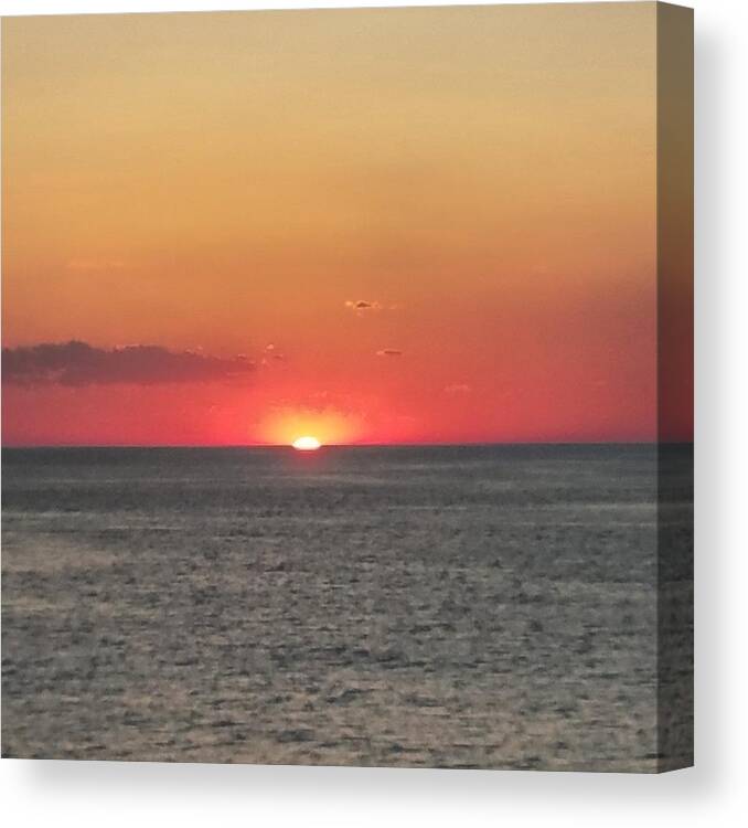 Sunset Canvas Print featuring the photograph Red Sun Sets Over Ocean by Vic Ritchey