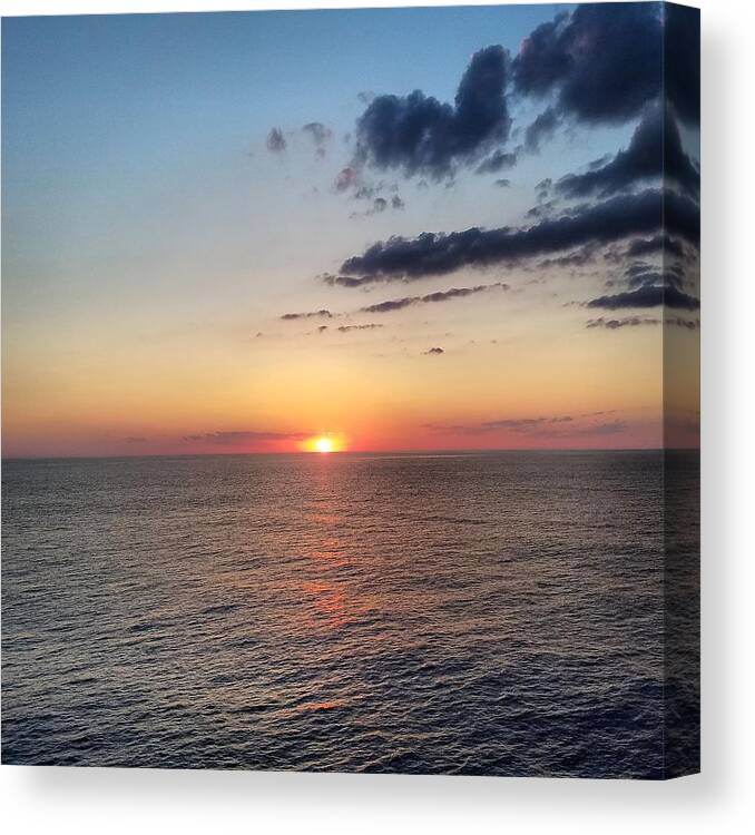 Sunset Canvas Print featuring the photograph Red Sunset Over Ocean by Vic Ritchey